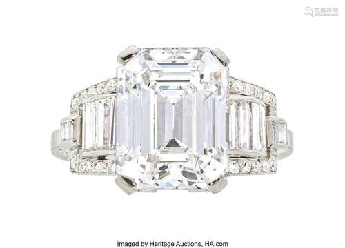 Diamond, Platinum Ring  Stones: Emerald-cut diamond weighing...