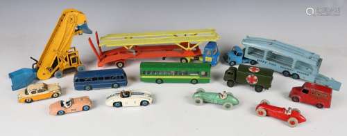 A collection of playworn Dinky Toys and Supertoys vehicles