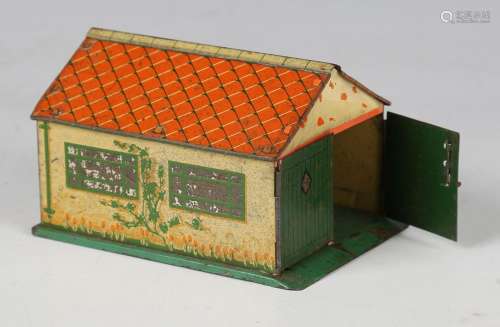 A Dinky Toys No. 45 tinplate garage with opening doors (some...