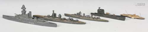 Three lead waterline models of naval ships