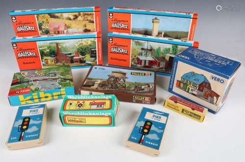 A good collection of gauge TT model buildings and accessorie...