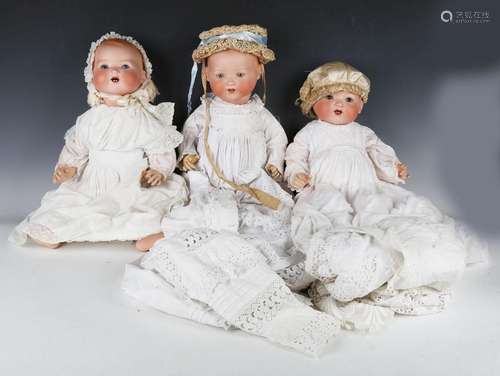 Four Armand Marseille bisque head baby dolls