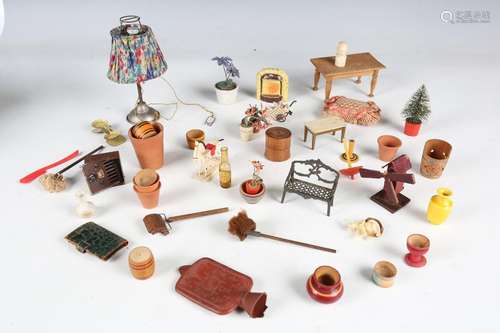 A collection of doll's house furniture and accessories