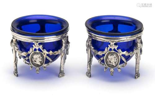 A pair of Dutch silver and blue glass salt cellars