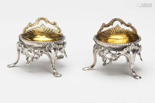 A pair of silver and gilt salt cellars