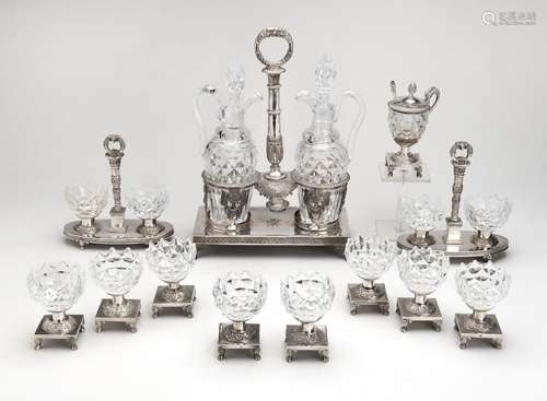 A large cut-glass and French silver condiment set