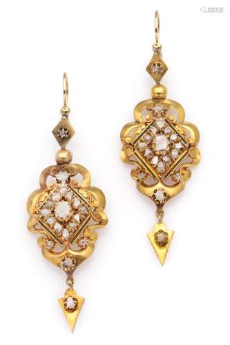 A pair of antique 14k gold diamond earrings