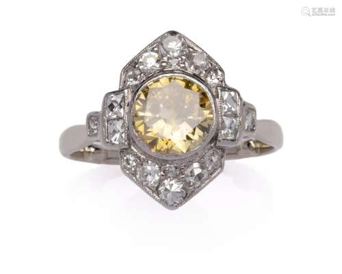 A platinum and 14k gold coloured diamond ring