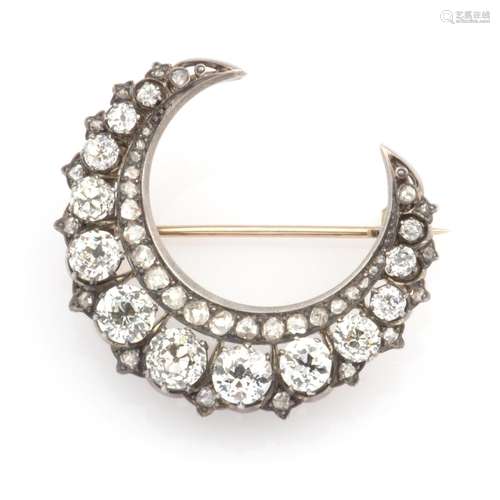 A diamond crescent brooch