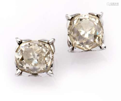 A pair of 18k white gold diamond single stone earstuds