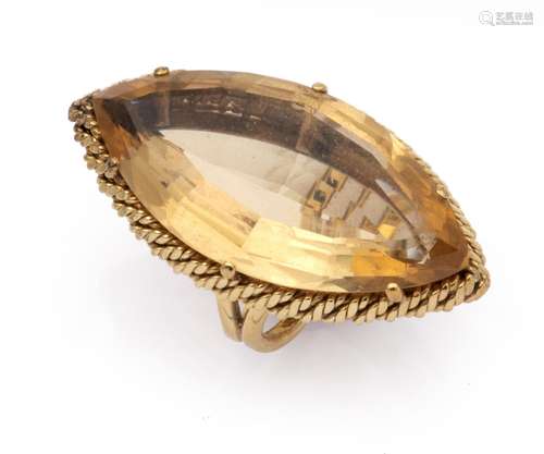 An 18k gold citrine dress ring