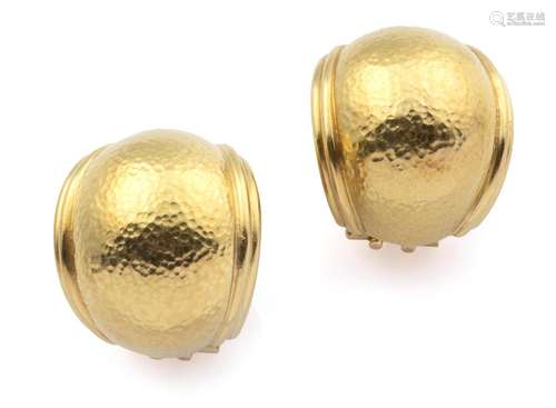 A pair of 18k gold earclips