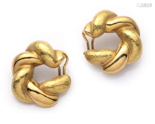 A pair of 18k gold earclips