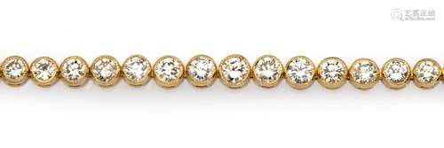 An 18k gold diamond line bracelet