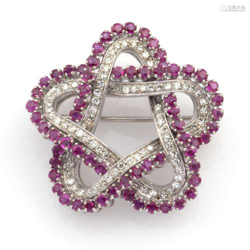 An 18k white gold ruby and diamond brooch