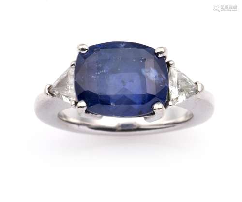 A 14k white gold sapphire and diamond ring