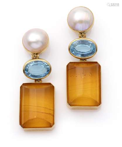 A pair of 18k gold gem set earclips, Pintaldi