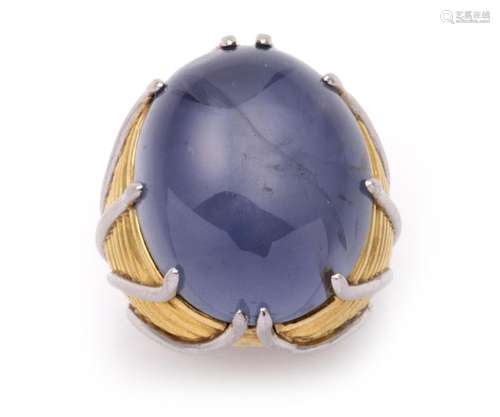 A platinum and 18k gold star sapphire ring