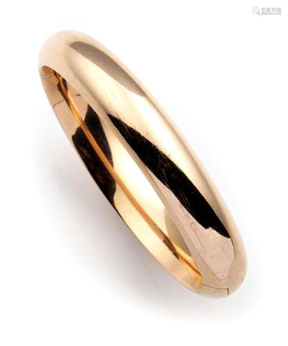 A 14k pink gold bangle