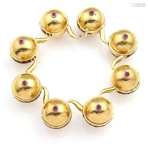 A 14k gold ruby bracelet