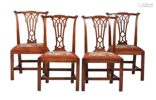 A SET OF FOUR GEORGE III MAHOGANY DINING CHAIRS