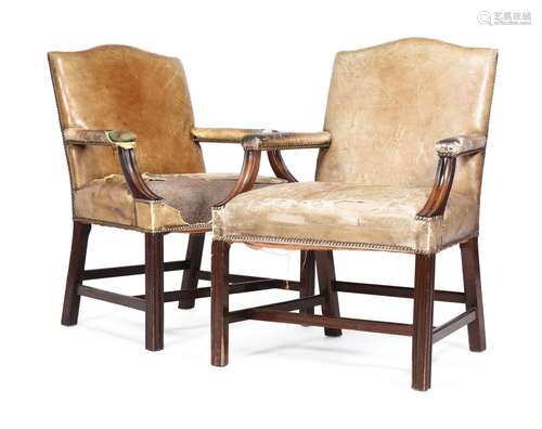 A PAIR OF MAHOGANY AND LEATHER UPHOLSTERED ARMCHAIRS IN GEOR...