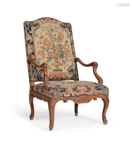 A LOUIS XV CARVED BEECH AND NEEDLEWORK UPHOLSTERED FAUTEUIL