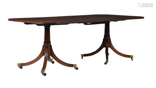 A MAHOGANY DINING TABLE IN GEORGE III STYLE