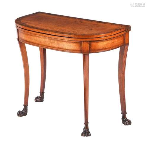 Y A GEORGE III MAPLE AND ROSEWOOD CARD TABLEIN THE MANNER OF...