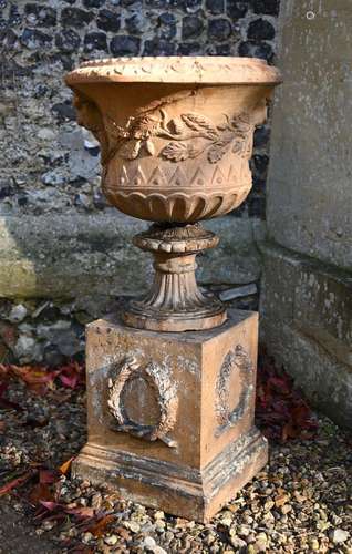 A BLASHFIELD STYLE GARDEN URN ON STAND