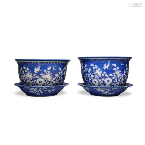 A pair of slip-decorated blue-ground \'bird and flower\' jar...