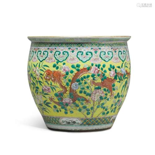 A large yellow-ground famille-rose fish bowl, 19th / 20th ce...