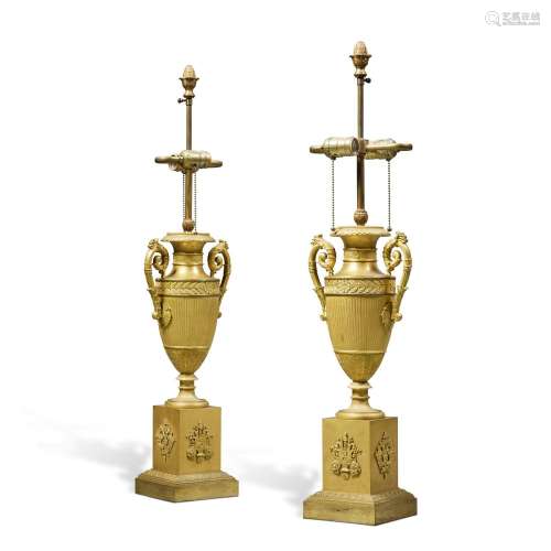 A pair of Empire gilt-bronze urns, circa 1810