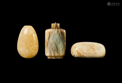 TWO CHINESE JADE PEBBLES & A JADE SNUFF BOTTLE, QING DYN...