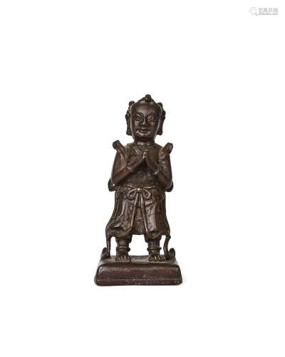 A CHINESE BRONZE FIGURE OF A PRAYING MAN, QING DYNASTY (1644...