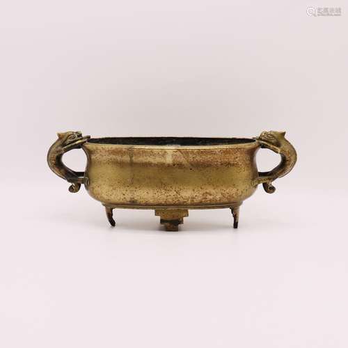 A CHINESE GILT BRONZE TRIPOD CENSER, QING DYNASTY (1644-1911...