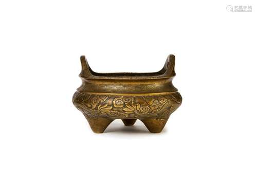 A CHINESE GILT BRONZE TRIPOD CENSER, QING DYNASTY (1644-1911...