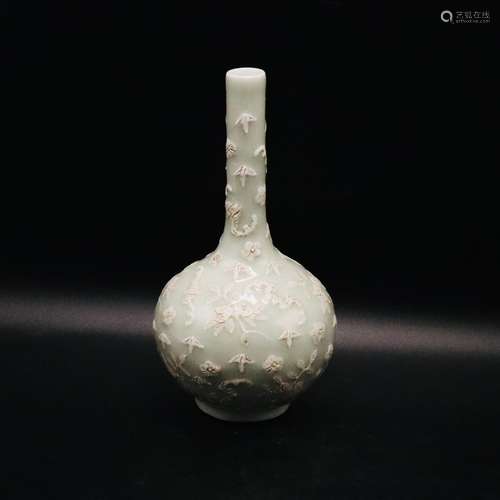 A CHINESE CELADON GROUND BOTTLE VASE, QING DYNASTY (1644-191...