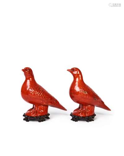 TWO IRON RED BIRDS ON ROSE WOOD STANDS, QIANLONG PERIOD (173...