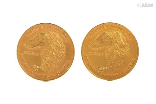 TWO GOLD DOG MEDALS, 2oz