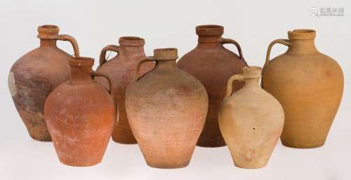 Seven unglazed clay pitchers, Toledo, late- 19th century -pp...