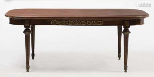 Walnut dining table with gilt bronze applications