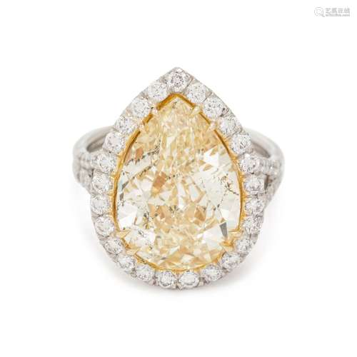 FANCY YELLOW DIAMOND AND DIAMOND RING