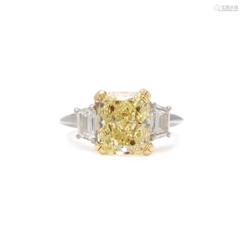 FANCY YELLOW DIAMOND AND DIAMOND RING