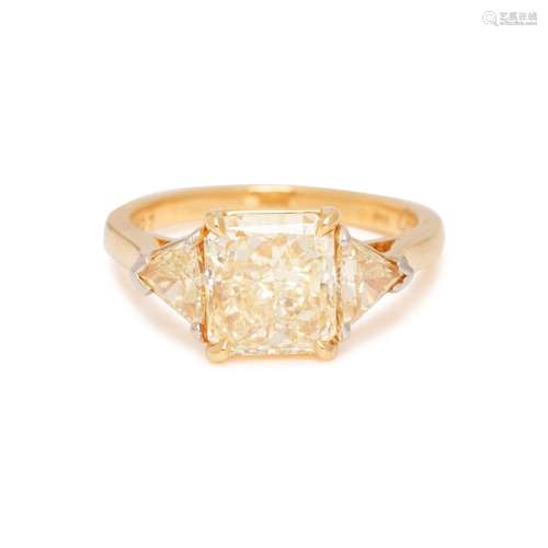 CARTIER, FANCY LIGHT YELLOW DIAMOND AND COLORED DIAMOND RING