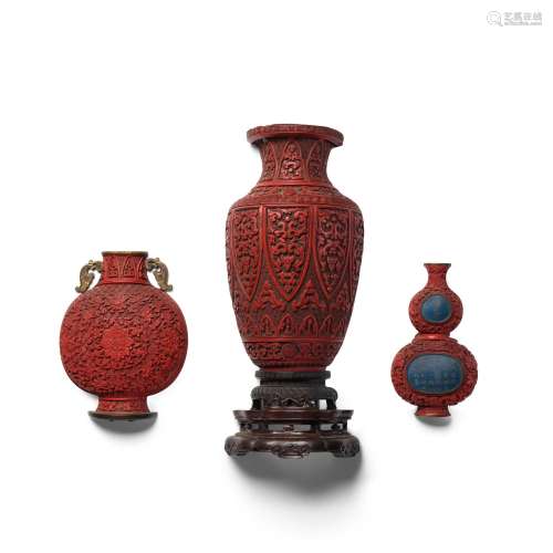 A GROUP OF THREE CARVED CINNABAR LACQUER WALL VASES Late 18t...