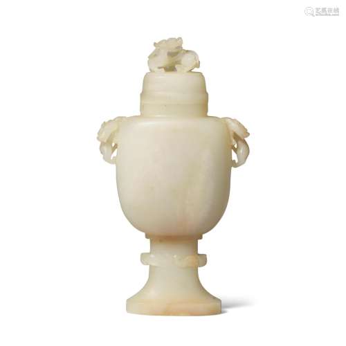 A PALE WHITISH-BEIGE AND RUSSET JADE COVERED VASE 19th centu...