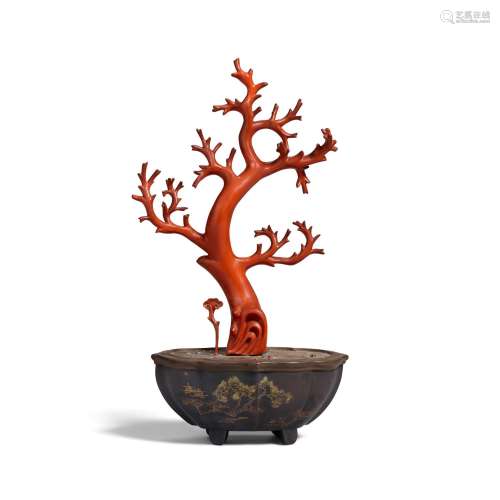 A LACQUER FAUX-CORAL 'TREE AND LINGZHI' IN A LACQUERED JARDI...