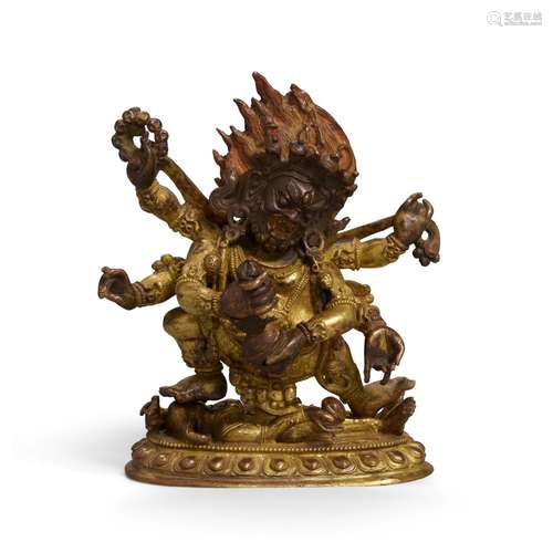 A GILT-BRONZE FIGURE OF MAHAKALA Tibet, 19th century