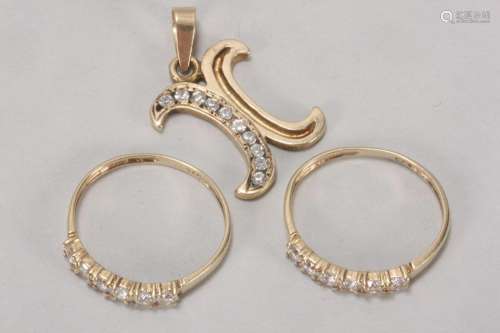 Two 9ct Gold and Clear Stone Rings,